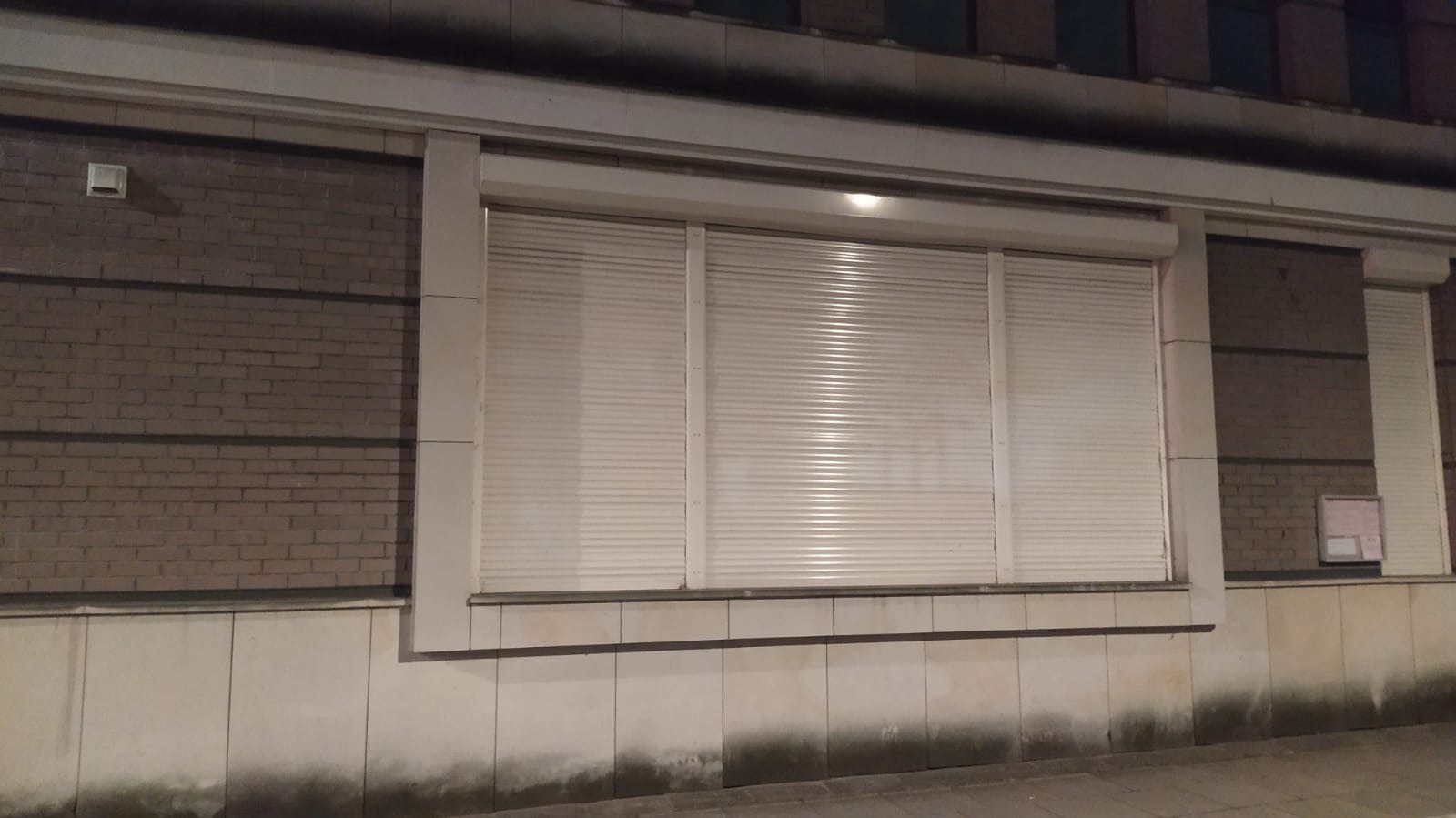 Exterior roller shutters on a residential facade, view 001
