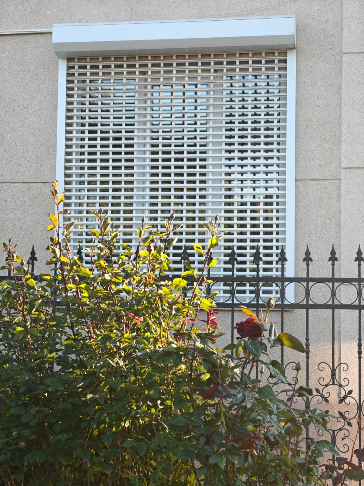 Exterior roller shutters on a residential facade, view 003