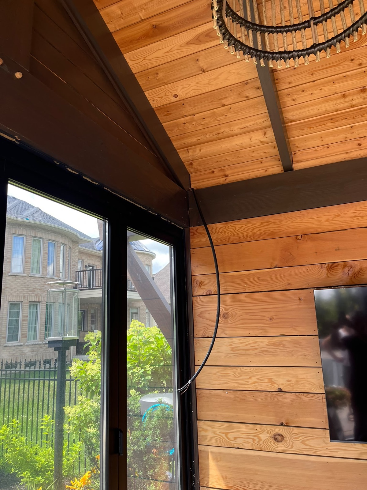 Outdoor screen system installed on a pool cabana, view 004