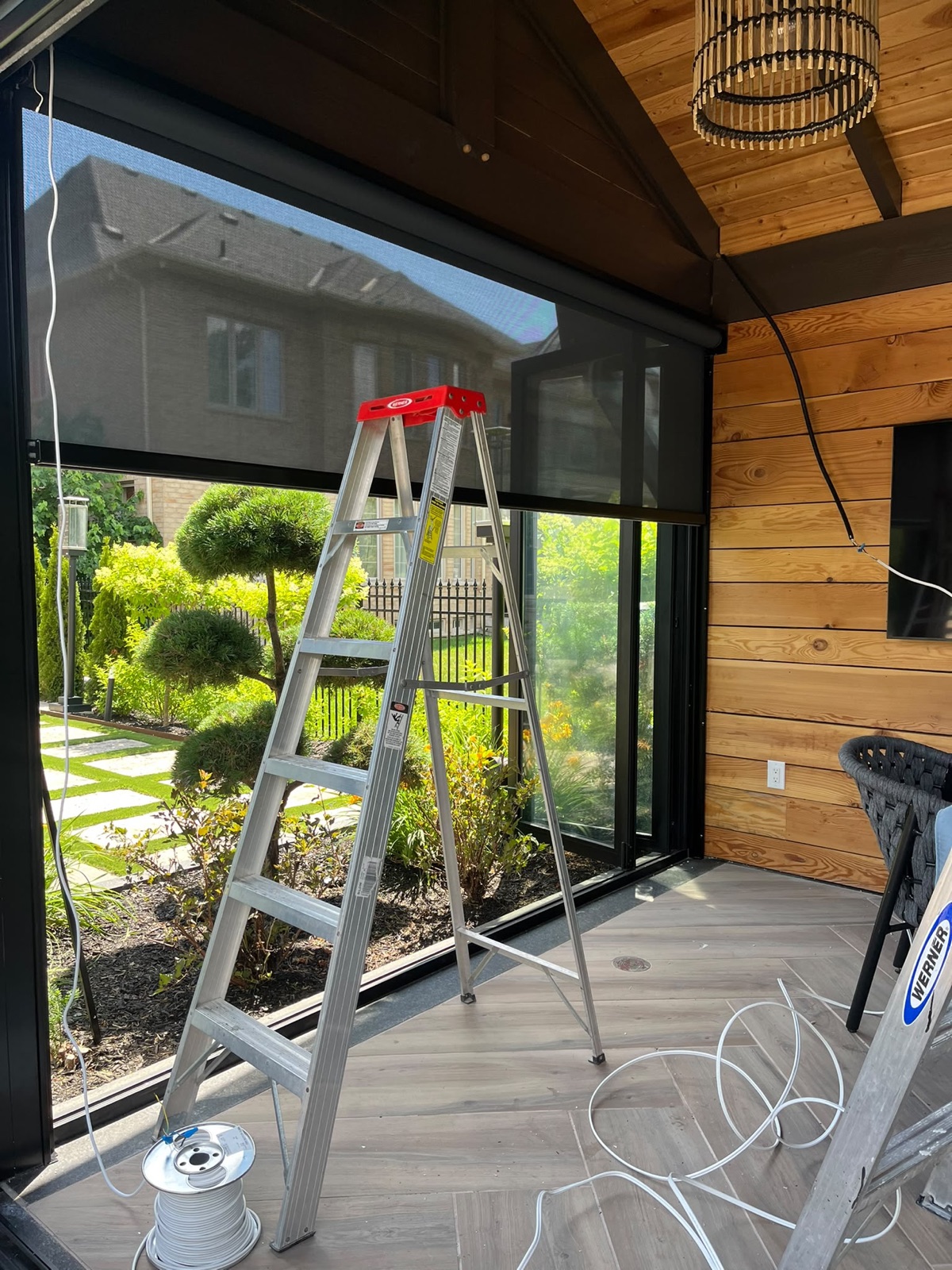 Outdoor screen system installed on a pool cabana, view 008